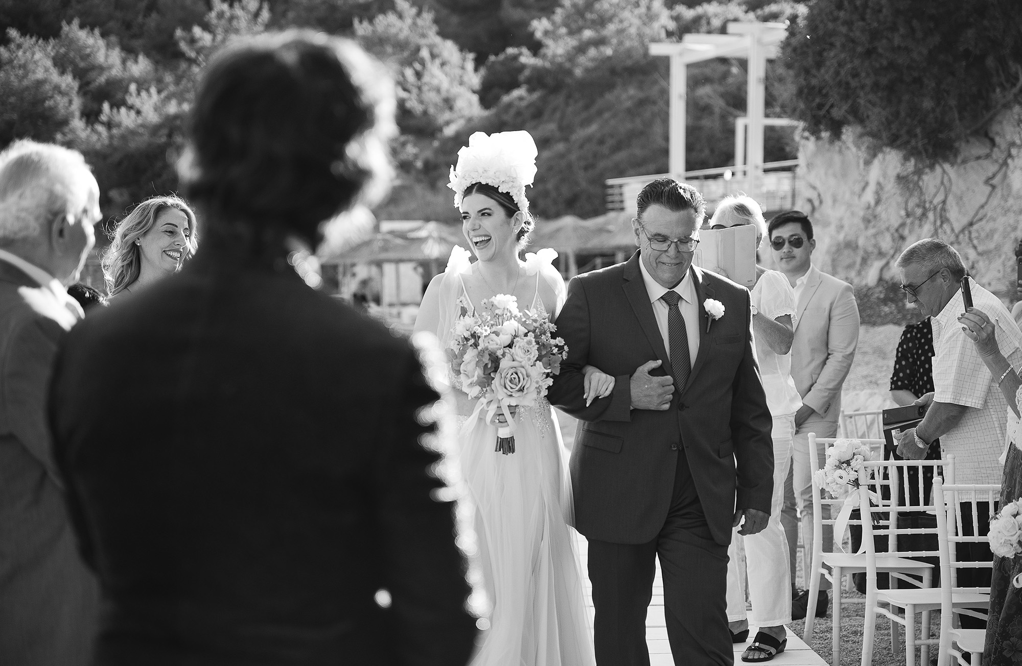 Emotional seaside wedding ceremony of Kosmas and Jacqueline at Proteas Blue Resort, Samos.