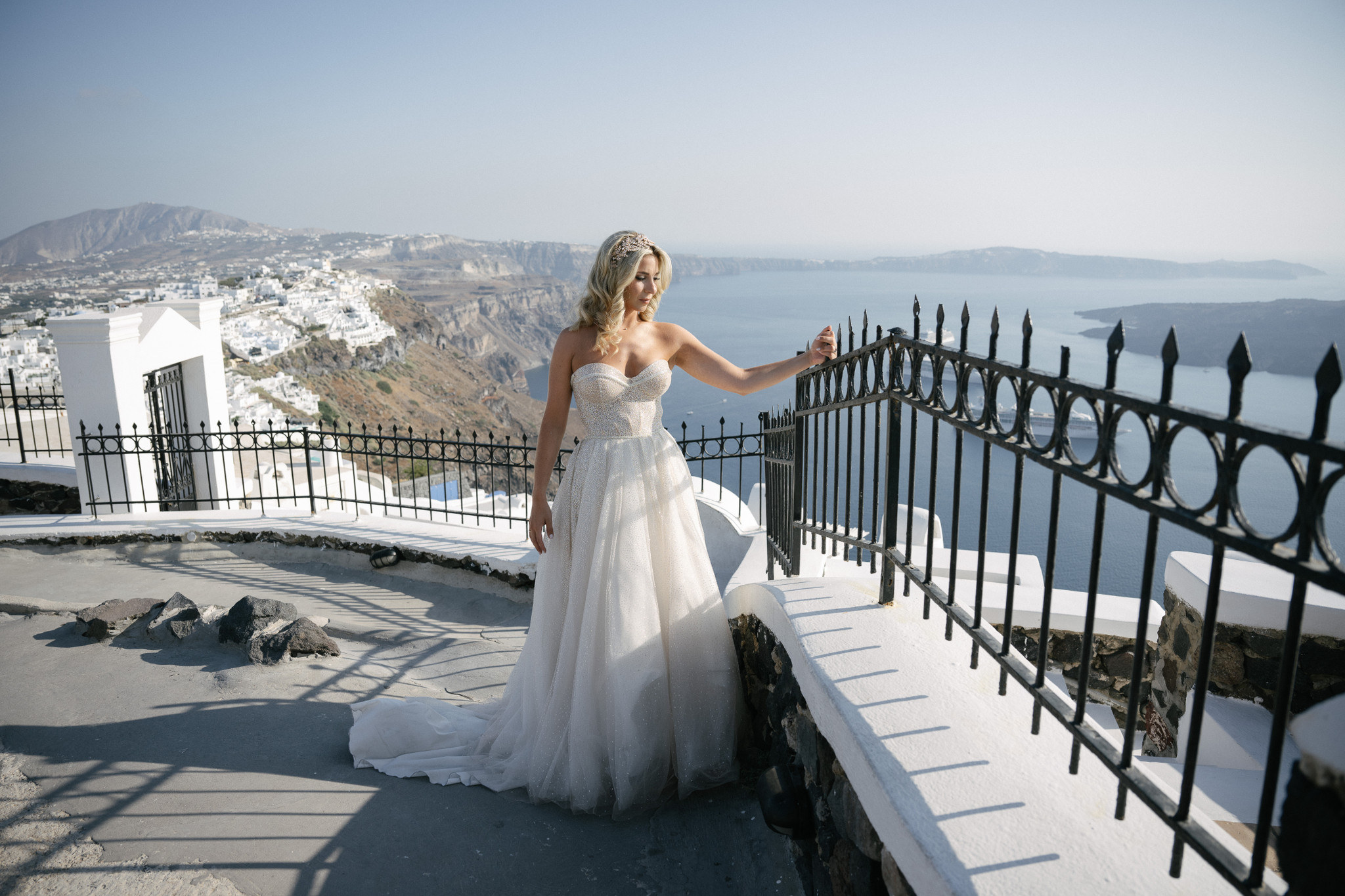 Bride in her wedding dress during a Santorini caldera portrait session